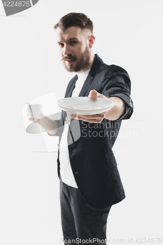 Image of Portrait of stylish handsome young man with cup of coffee