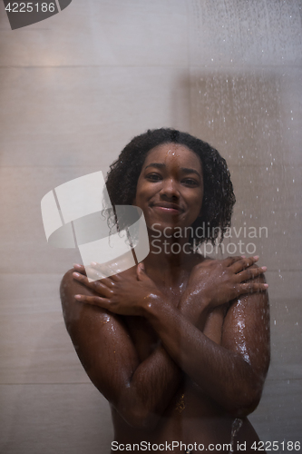 Image of African American woman in the shower