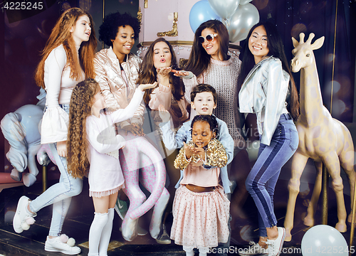 Image of Lifestyle and people concept: young pretty diversity nations woman with different age children celebrating on birth day party together happy smiling, making selfie. African-american, asian and caucasi