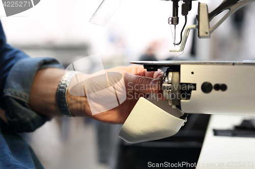 Image of Seamstress. Sewing. Factory, sewing room.