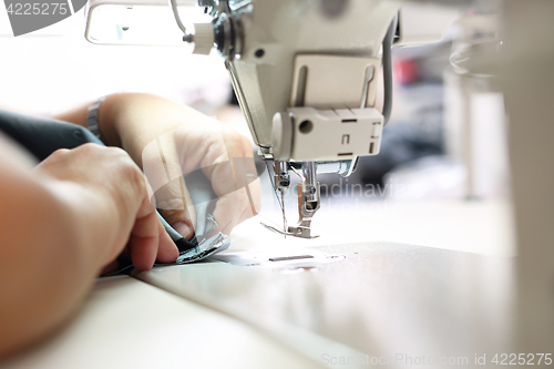 Image of Sewing. Factory, sewing room. Production of apparel.