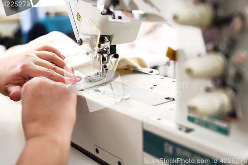 Image of Sewing. Factory, sewing room. Production of apparel.