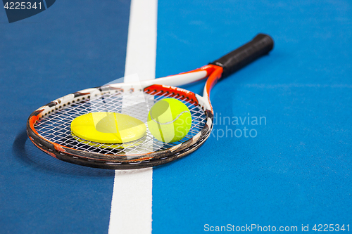 Image of The tennis ball on a tennis court