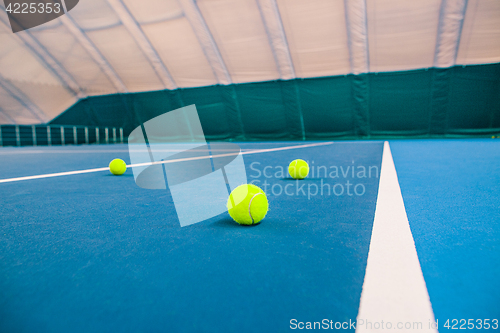 Image of The tennis ball on a tennis court
