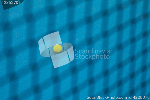 Image of The tennis ball on a tennis court