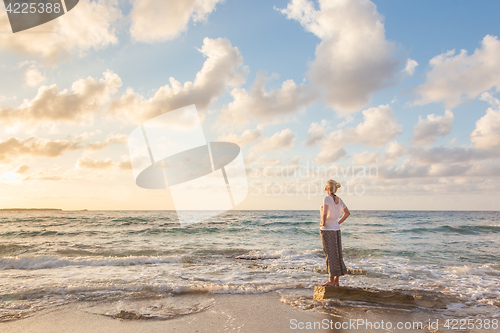 Image of Free Happy Woman Enjoying Sunset on Sandy Beach