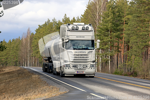 Image of White Super Scania Tanker on Rural Road