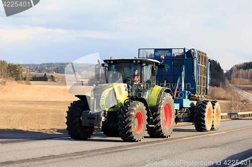 Image of Claas Farm Tractor and Beet Harvester on Road