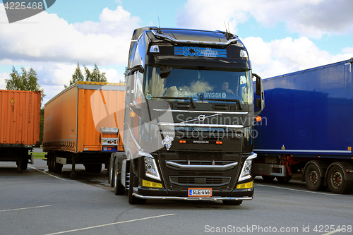 Image of Volvo FH Truck Driver Detaches Cargo Trailer