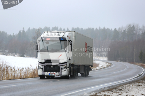 Image of White Renault Trucks T Hauls Cargo in Winter