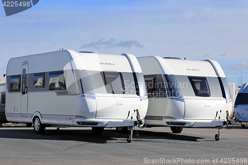Image of Two Modern Hobby Caravans on Display