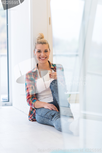 Image of Portrait of a beautiful girl on the floor