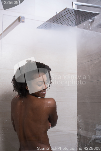 Image of African American woman in the shower