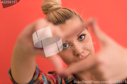 Image of young woman over color background