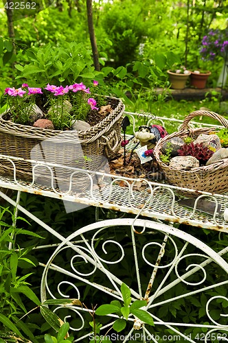 Image of Flower cart in garden