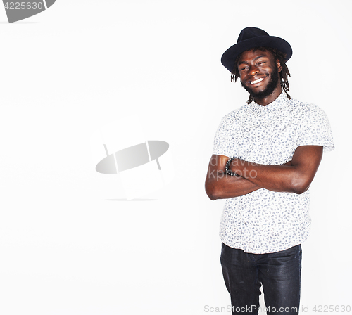 Image of young handsome afro american boy in stylish hipster hat gesturin