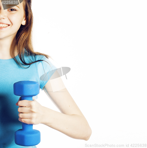 Image of young pretty brunette woman with blue dumbbell isolated cheerful