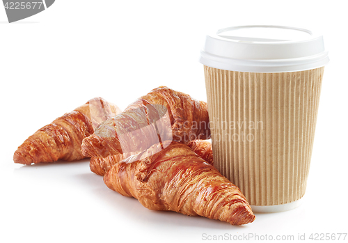 Image of Cup of coffee and croissants