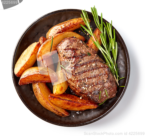 Image of grilled beef steak and potatoes