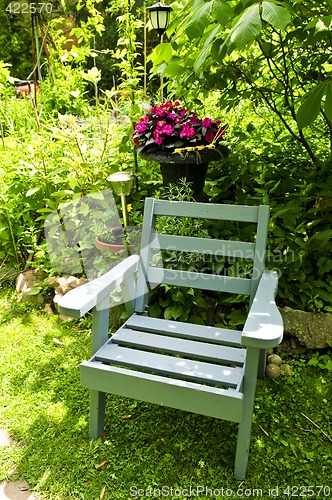 Image of Chair in green garden