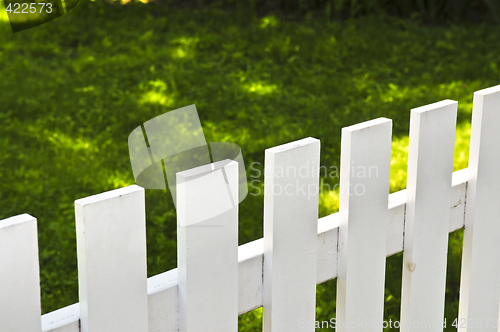 Image of Front yard with white fence