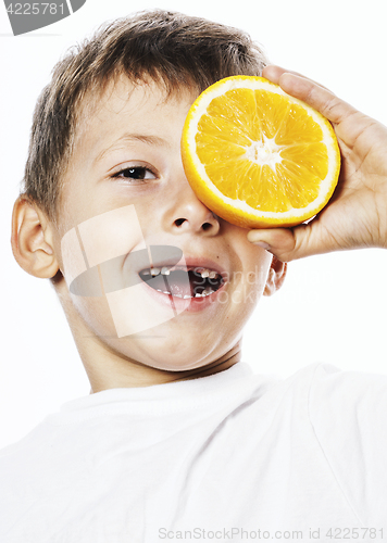 Image of little cute boy with orange fruit double isolated on white smili