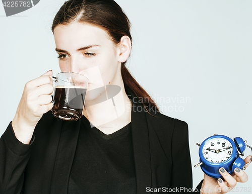 Image of young beauty woman in business style costume waking up for work 