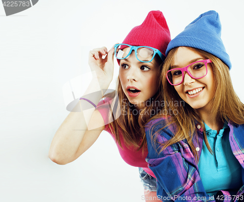 Image of best friends teenage girls together having fun, posing emotional on white background, besties happy smiling, lifestyle people concept close up