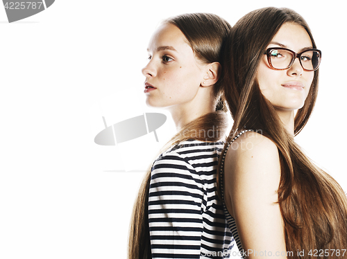 Image of two young workers isolated on white, same dresses in strip