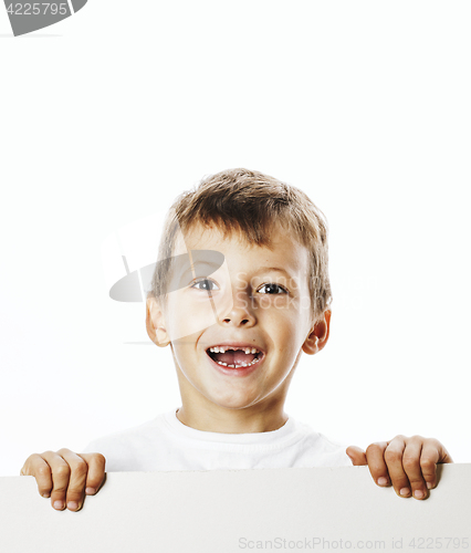 Image of little cute boy holding empty shit to copyspace isolated close u