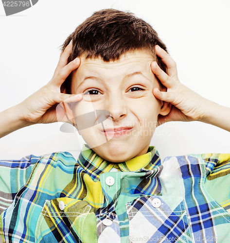 Image of young pretty little cute boy kid wondering, posing emotional face isolated on white background, gesture happy smiling close up, lifestyle people concept 
