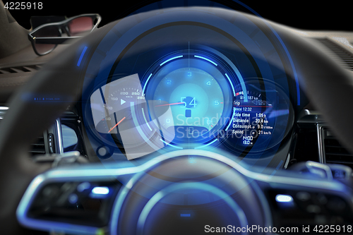 Image of close up of car dashboard and steering wheel