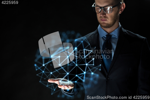 Image of close up of businessman with network projection