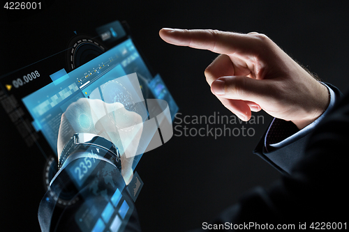 Image of close up of businessman hands with smartwatch