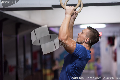 Image of man doing dipping exercise