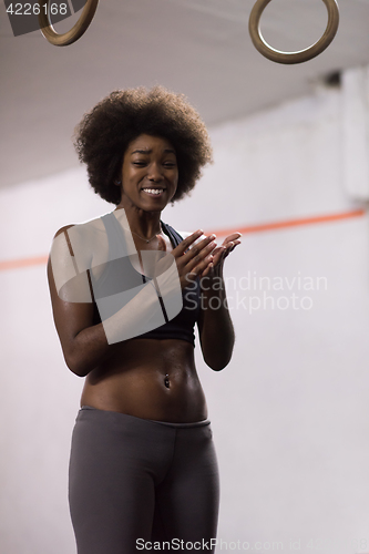 Image of black woman doing dipping exercise