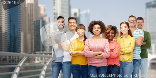 Image of international group of happy people  in dubai