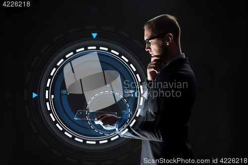 Image of businessman with transparent tablet pc