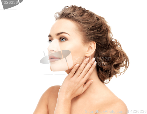 Image of face and hands of beautiful woman