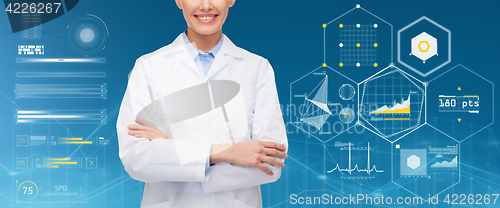 Image of happy doctor over blue background and charts