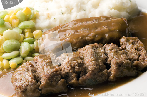 Image of meatloaf with mashed potatoes and succotash