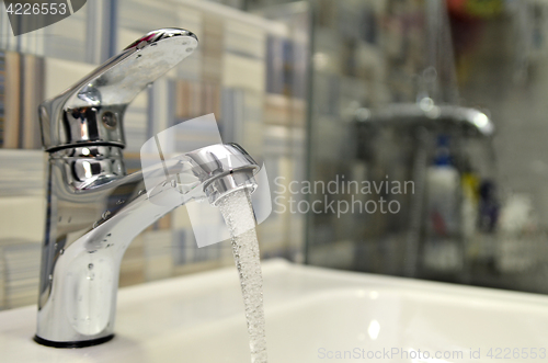 Image of Opened water tap