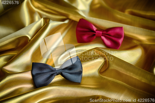 Image of Red and black bow ties