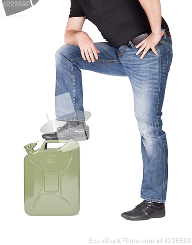 Image of Man opening jerry can. 