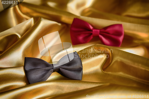 Image of Red and black bow ties