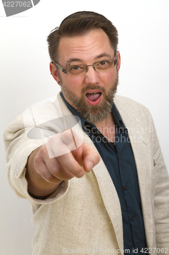 Image of Bearded man is calling and gestures with his finger