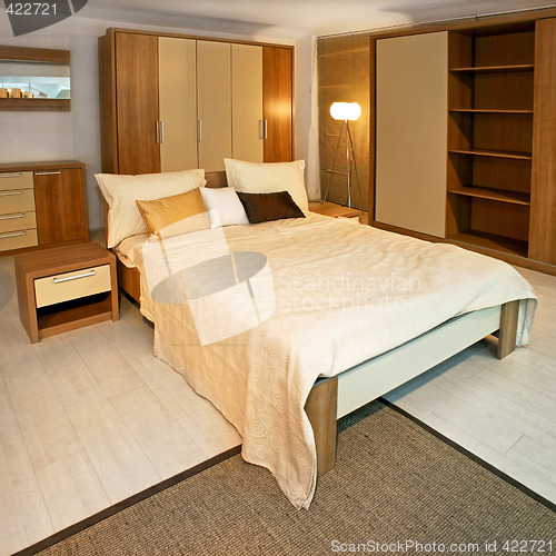 Image of Wooden bedroom angle