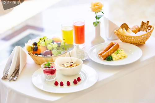 Image of delicious breakfast for two at the luxury hotel.