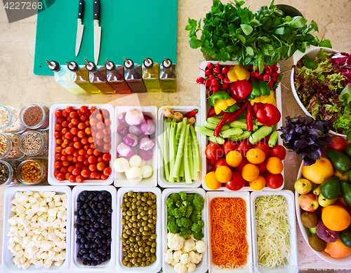 Image of Salad Bar Fresh Vegetables sliced Top view Tomato Carrot Celery Cucumber Cherry tomato Sweet pepper.