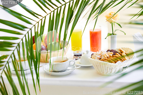 Image of delicious breakfast for two at the luxury hotel.
